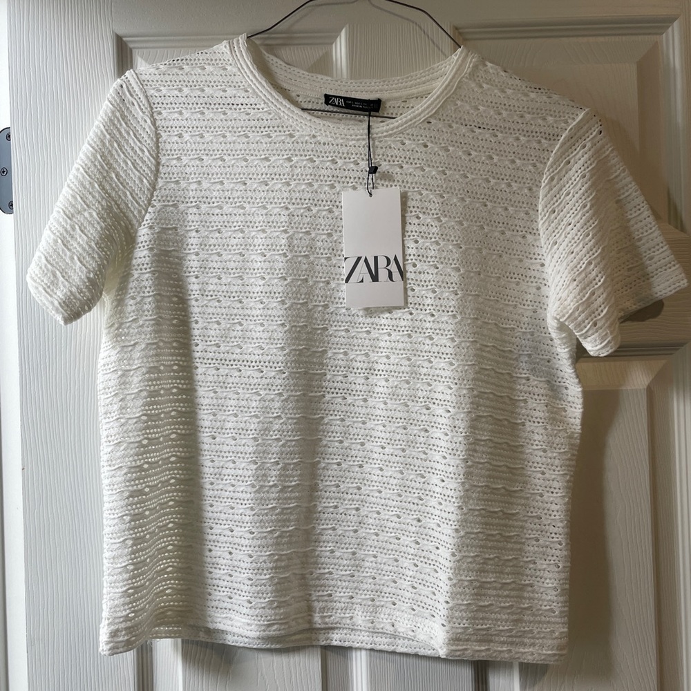 Zara women’s white shirt sleeve “eyelet” top. NWT. Size L.